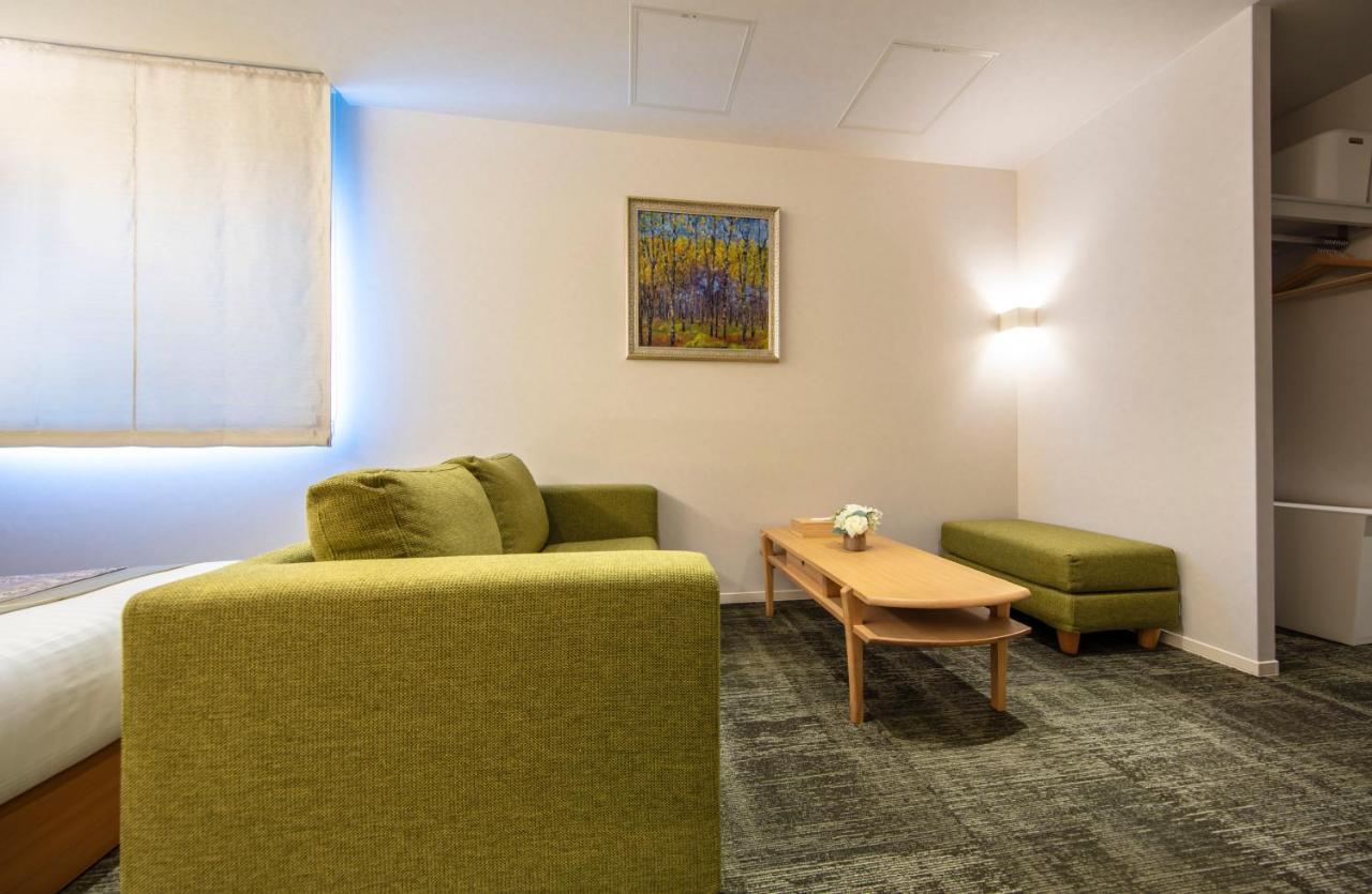 Grand Base Okayama Ekimae Aparthotel Kültér fotó