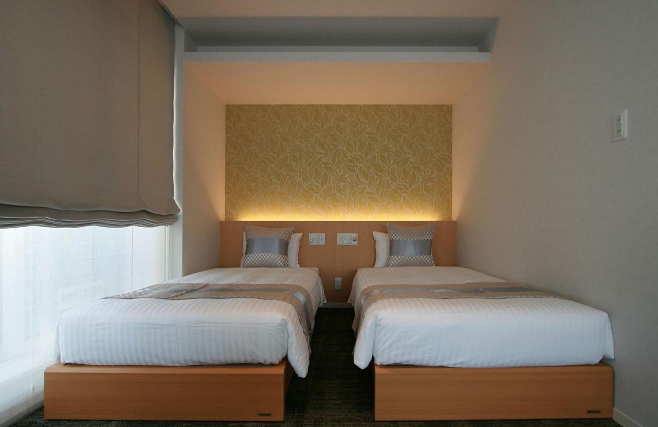 Grand Base Okayama Ekimae Aparthotel Kültér fotó