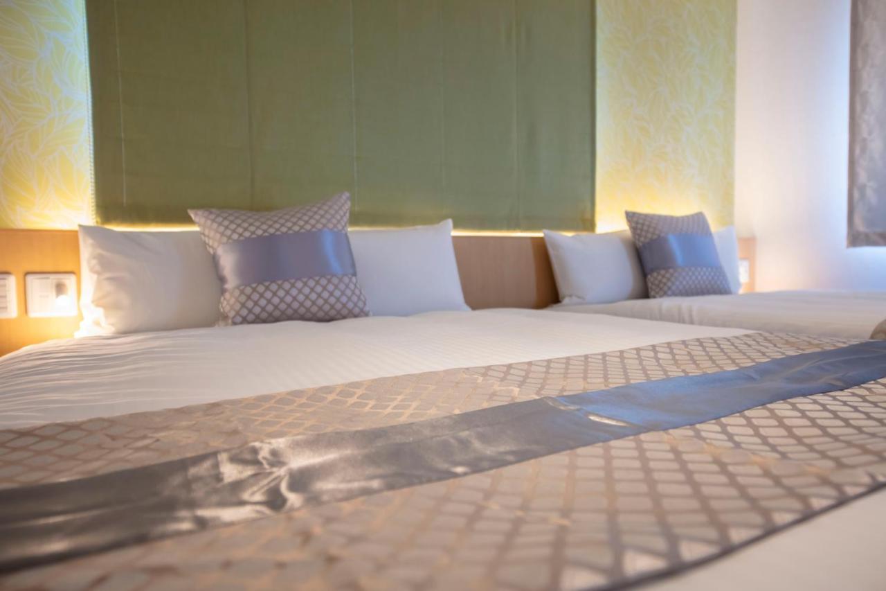 Grand Base Okayama Ekimae Aparthotel Kültér fotó