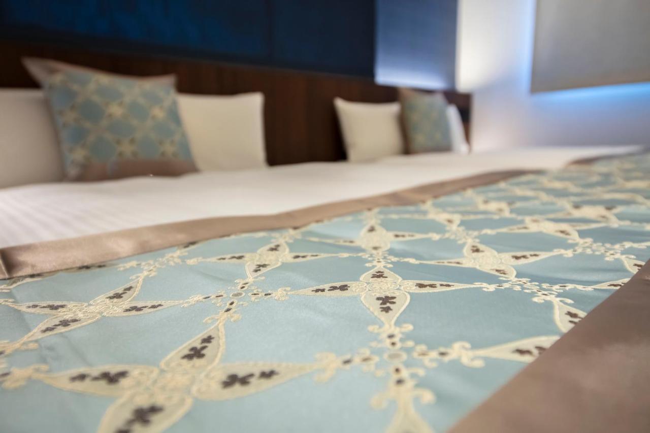 Grand Base Okayama Ekimae Aparthotel Kültér fotó