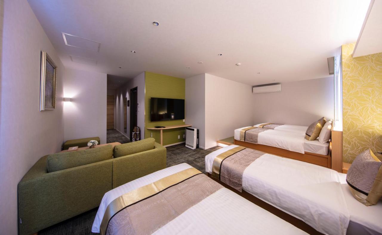 Grand Base Okayama Ekimae Aparthotel Kültér fotó